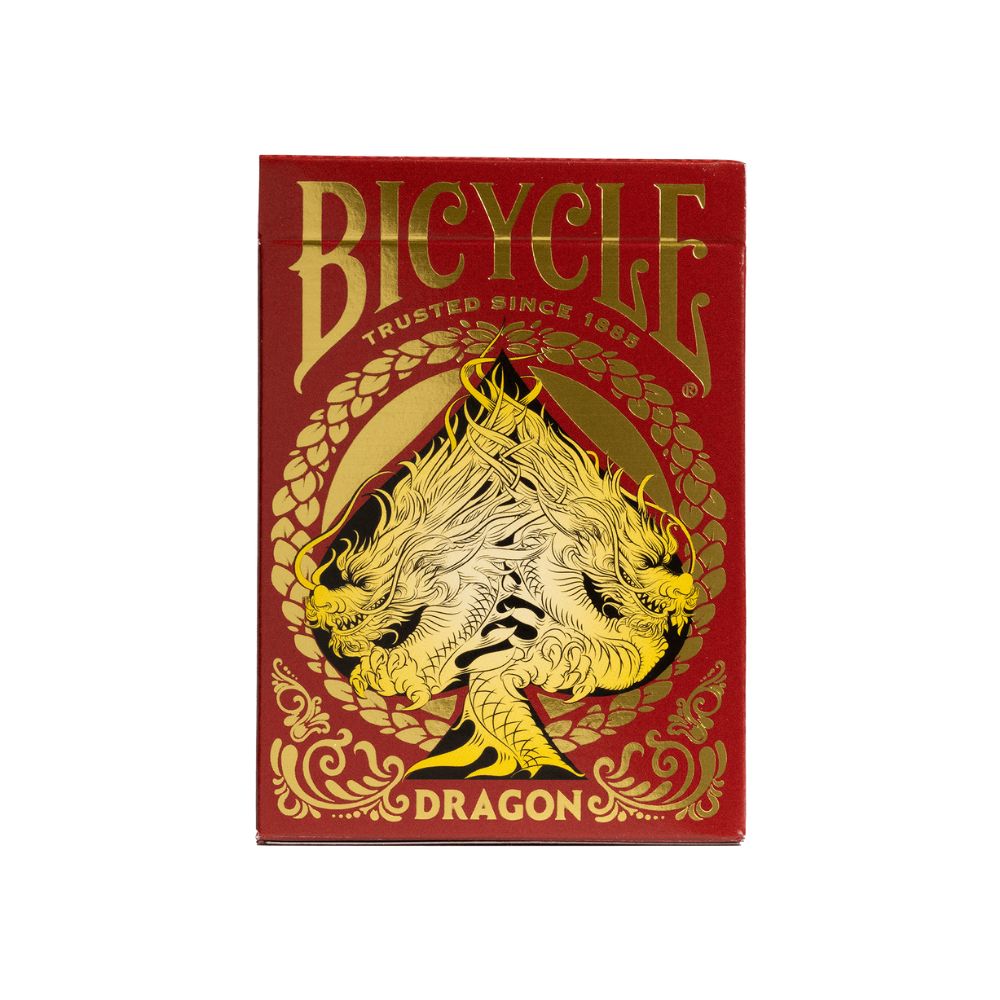 A pack of Bicycle Red Dragon playing cards with dragon-inspired imagery on the back, predominantly red and gold colors.