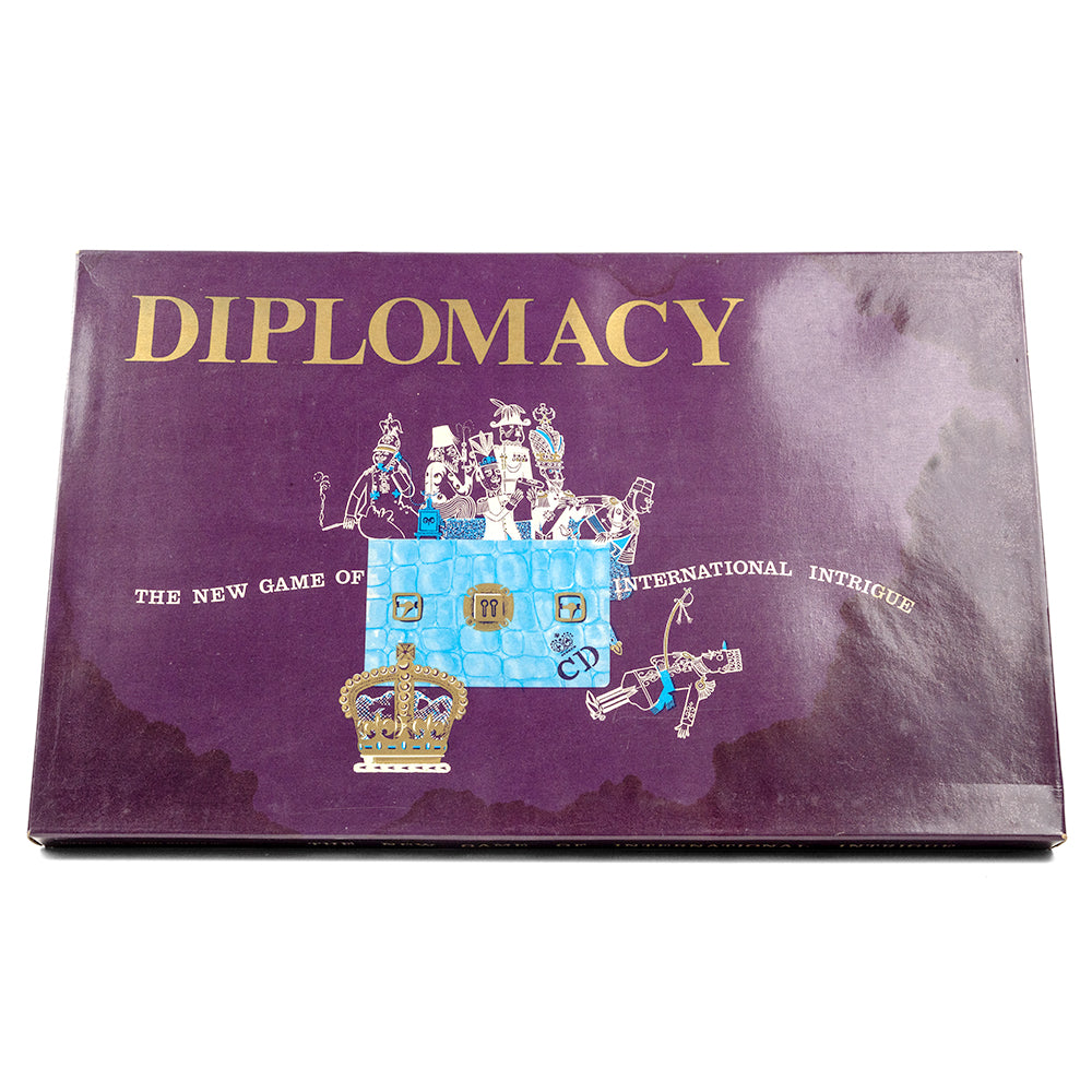 The image shows a purple box of the board game 'Diplomacy', featuring illustrations of European military units and a crowned figure on the cover, indicating it's a vintage edition.