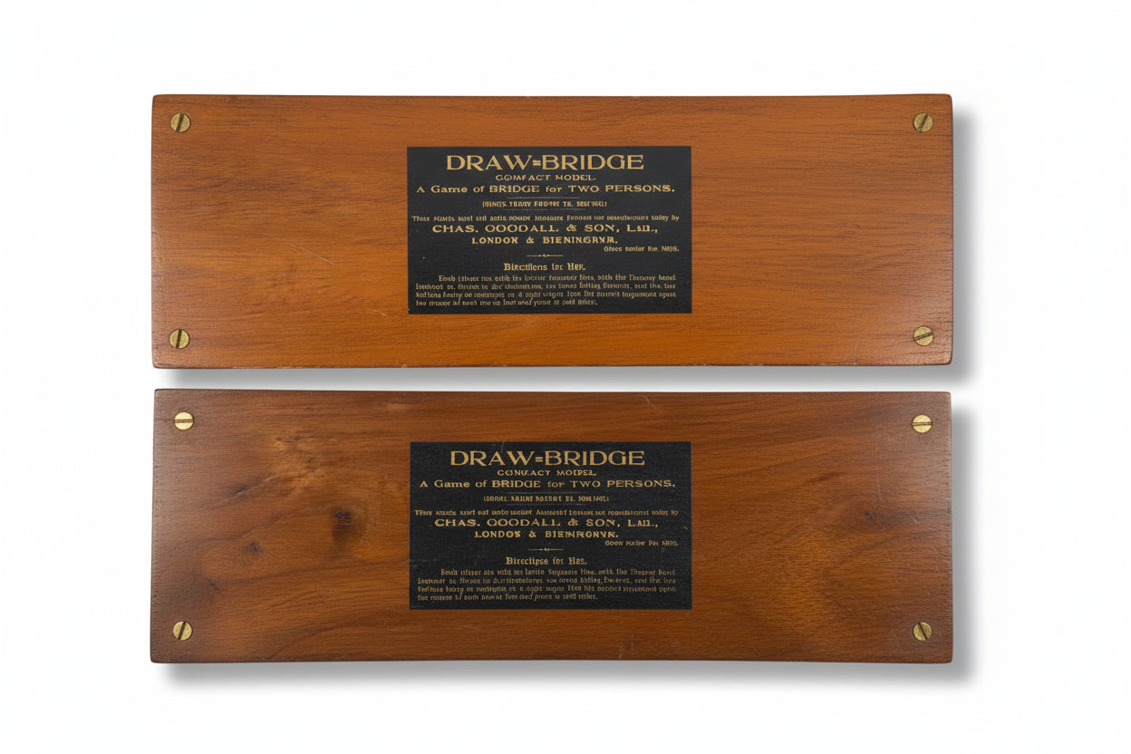Two mahogany plaques with gold printed trade labels