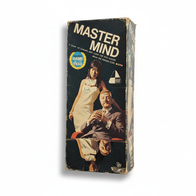 Vintage 'Master Mind' game box with illustration of a man and woman on a white background