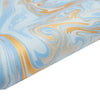 Powder blue hand-marbled wrapping paper