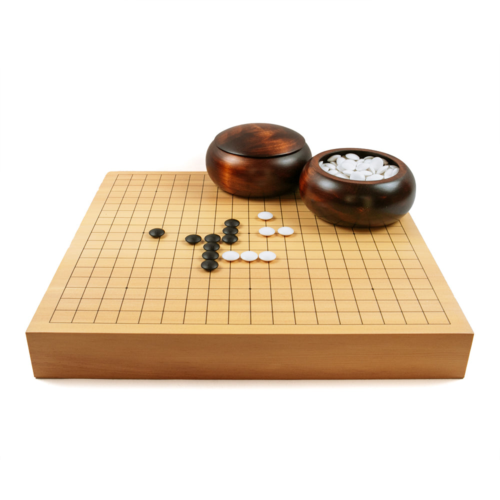 Go stone bowls: dark stained linden wood